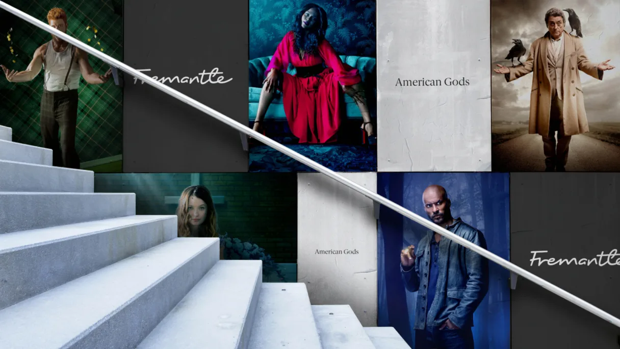 Diagonal staircase in the foreground, with dramatic character portraits and 'Fremantle' text in the background, creating a cinematic feel